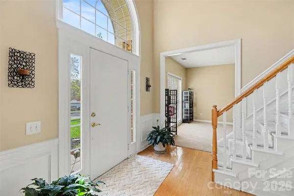 kids view of hall way with furniture and livingroom view