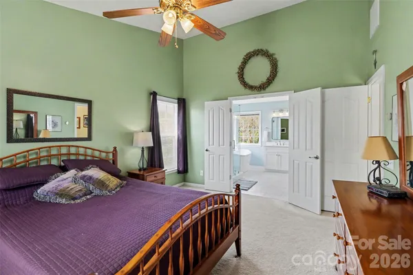 a white bath tub sitting next to a window