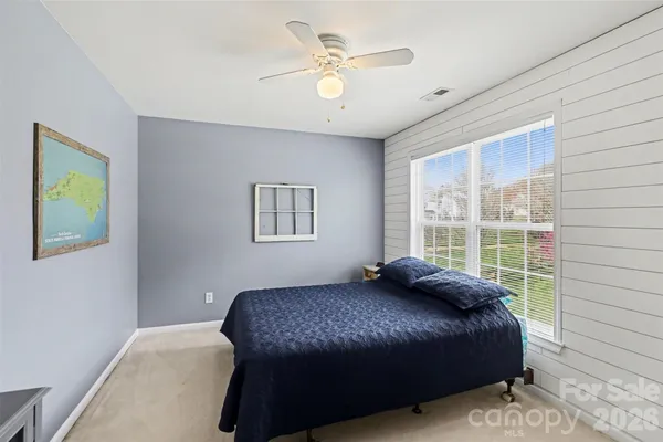 a view of livingroom with workspace and window