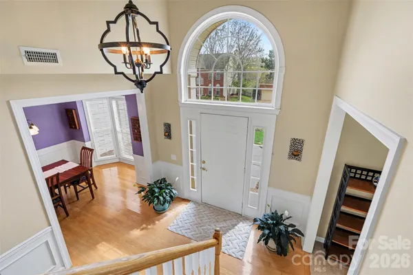 a bedroom with furniture and a fireplace