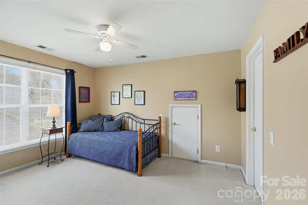 a room with furniture and a window