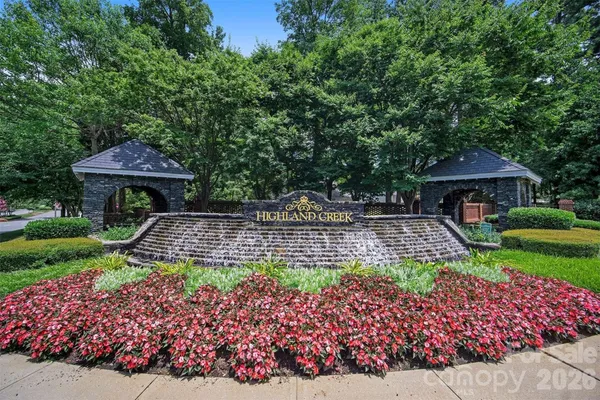 a view of a golf course with a lake