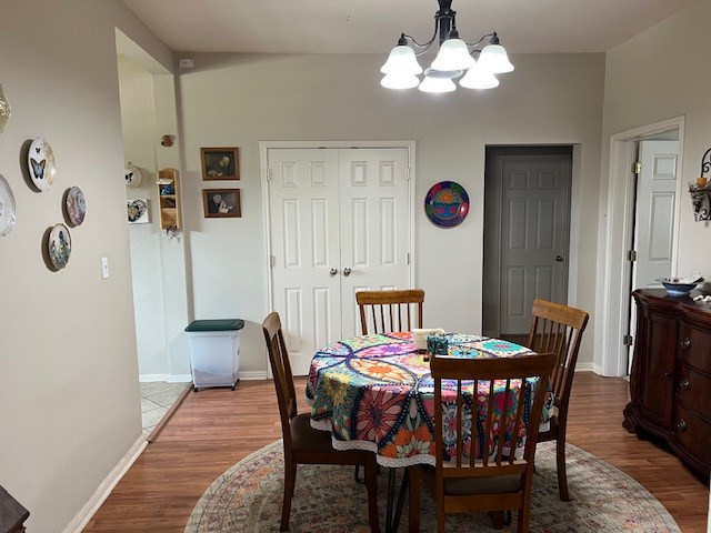406 West 8th Street Brady, TX 76825 - Photo 14 of 33 a view of a dining room with furniture and wooden floor