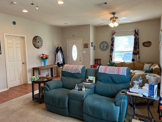 406 West 8th Street Brady, TX 76825 - Photo 5 of 33 a living room with furniture a ceiling fan and a window