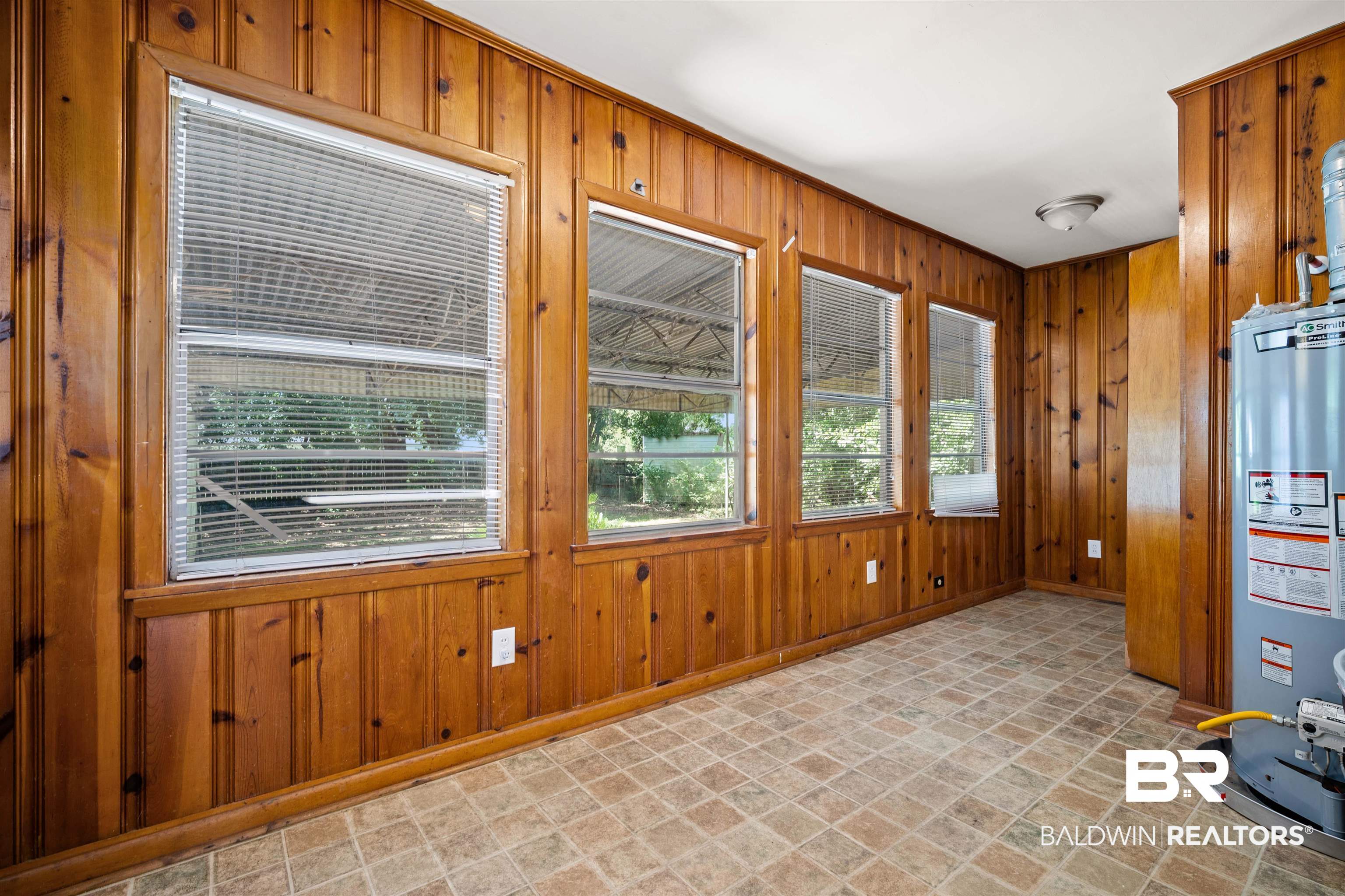 9 Elizabeth Avenue Mobile, AL 36611 - Photo 18 of 19 Unfurnished sunroom with gas water heater