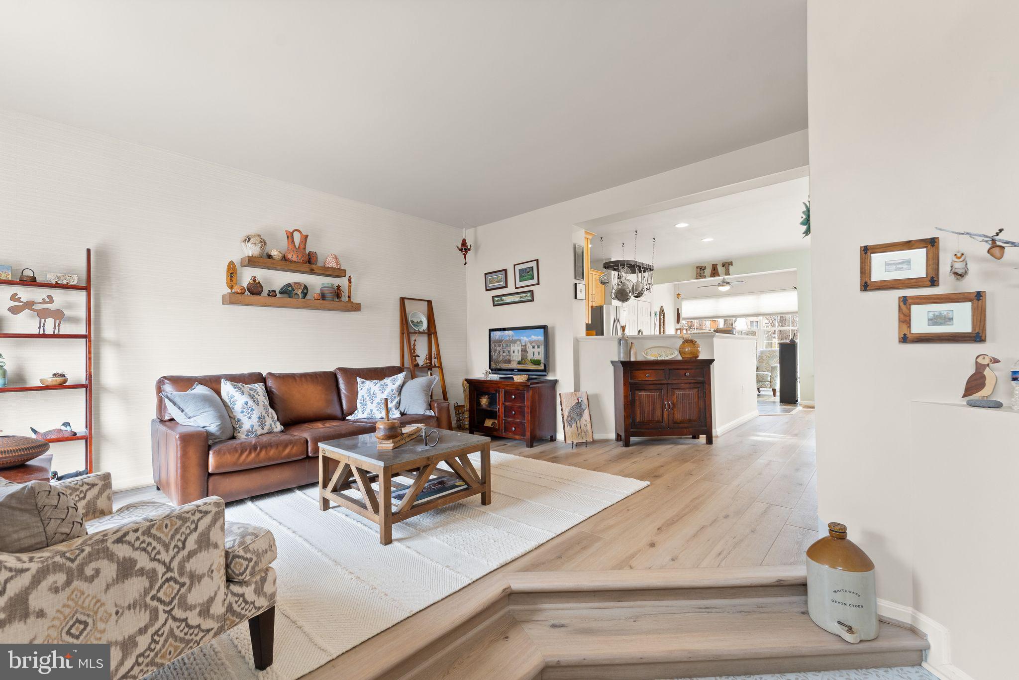6377 St Timothys Lane Centreville, VA 20121 - Photo 14 of 58 a living room with furniture and a flat screen tv