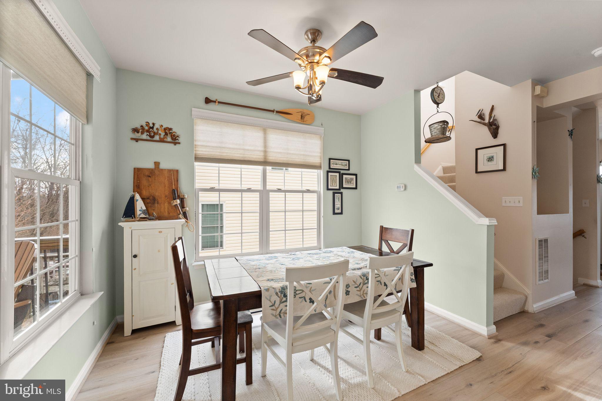 6377 St Timothys Lane Centreville, VA 20121 - Photo 18 of 58 a view of a dining room with furniture window and wooden floor