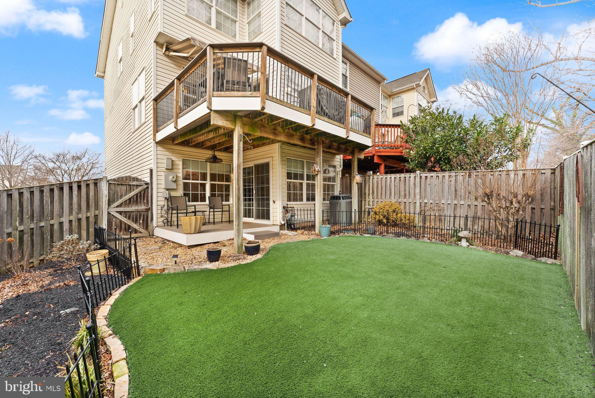 6377 St Timothys Lane Centreville, VA 20121 - Photo 2 of 58 a view of a house with backyard porch and sitting area