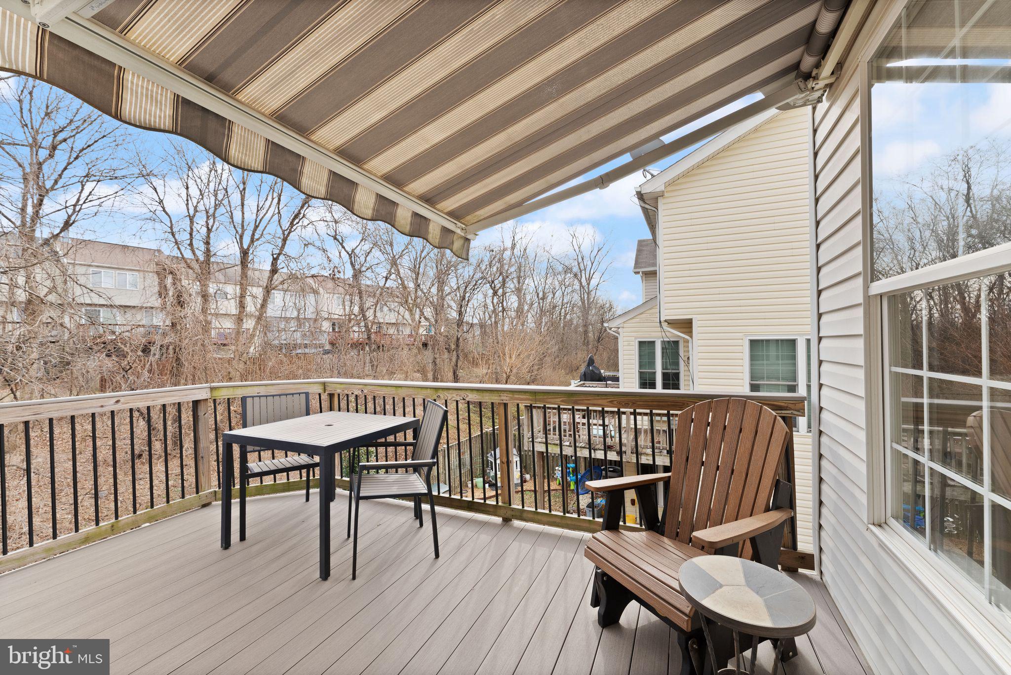 6377 St Timothys Lane Centreville, VA 20121 - Photo 24 of 58 a view of balcony with wooden floor and outdoor seating