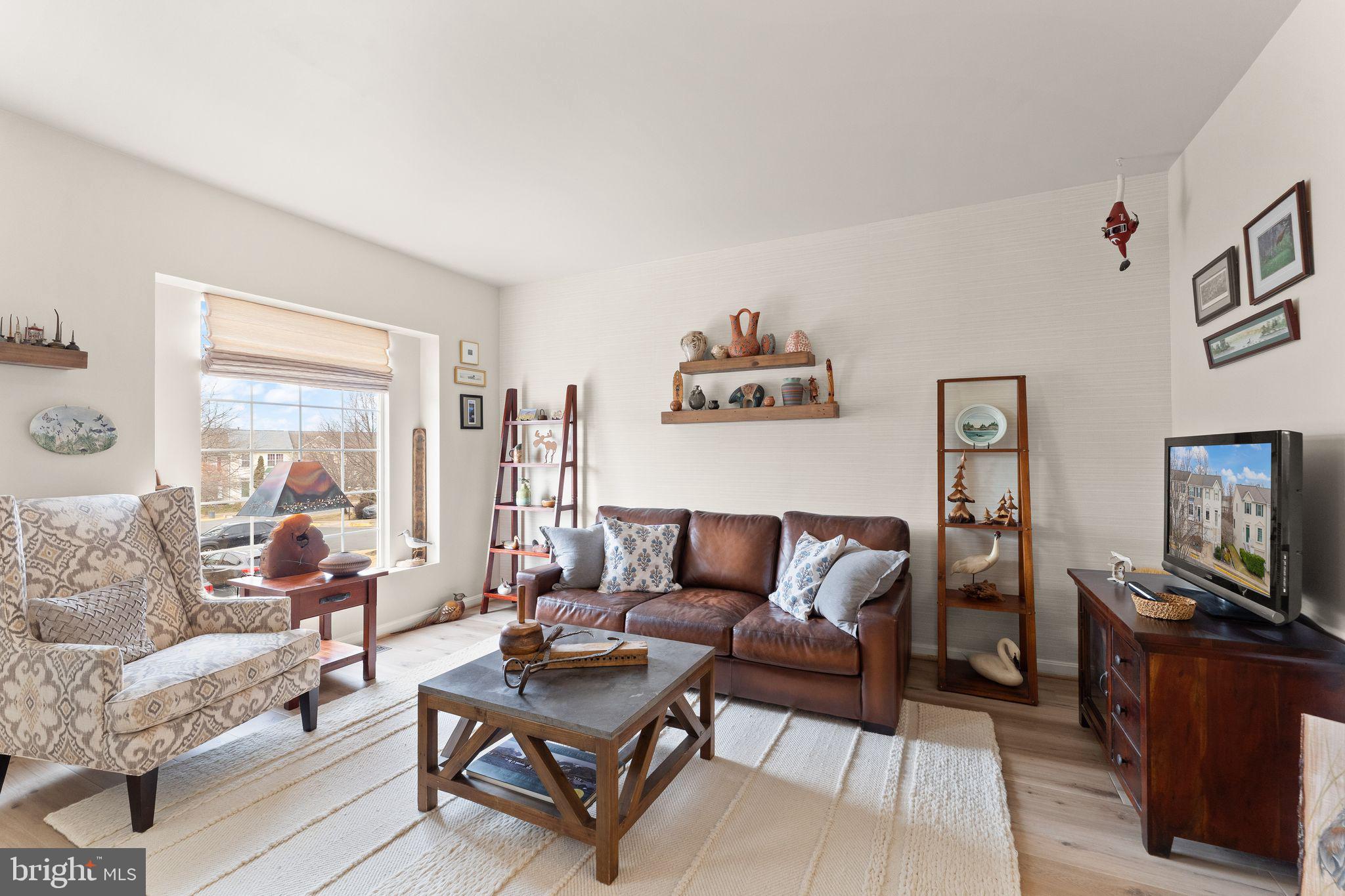 6377 St Timothys Lane Centreville, VA 20121 - Photo 3 of 58 a living room with furniture and a flat screen tv