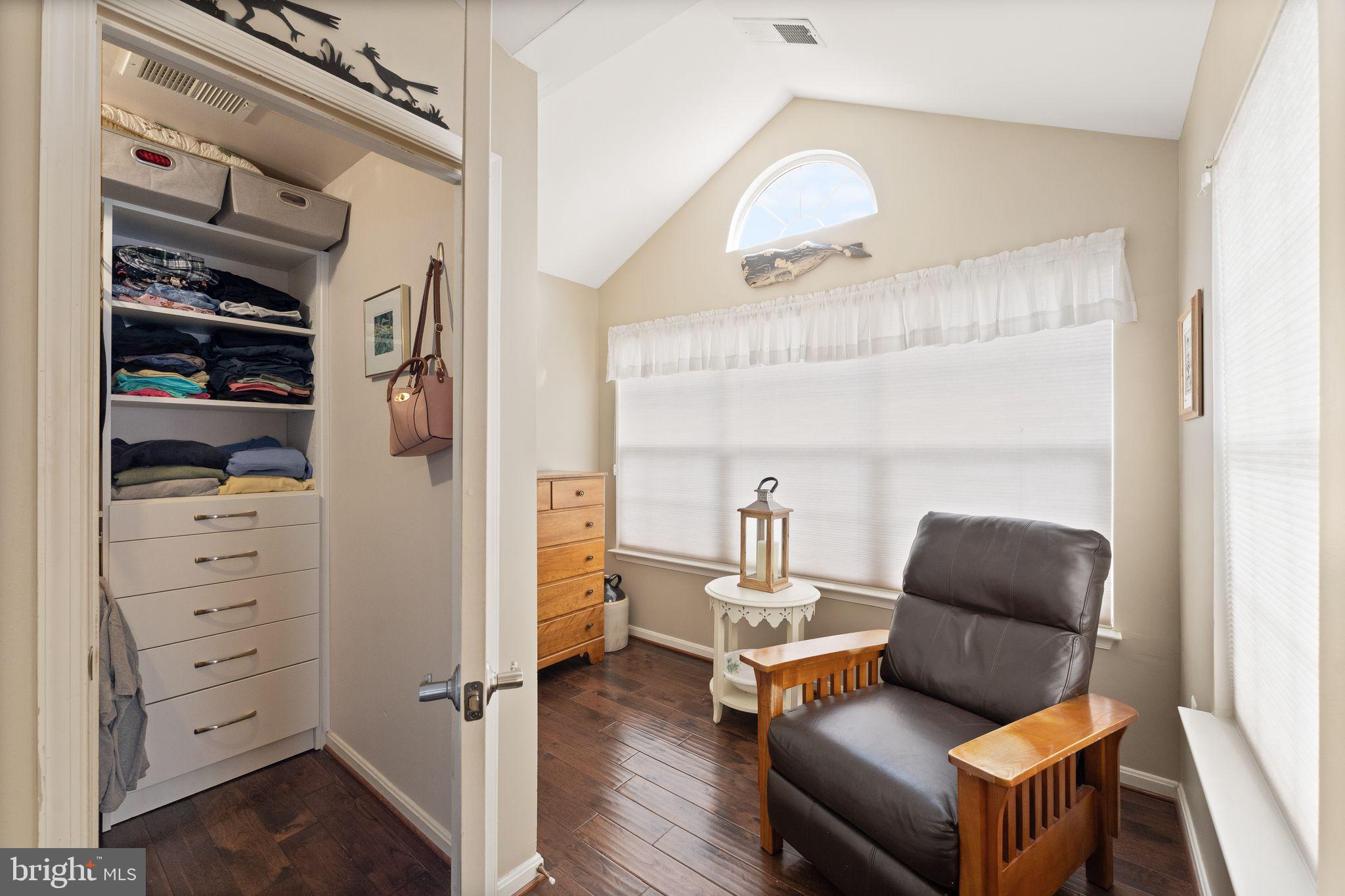 6377 St Timothys Lane Centreville, VA 20121 - Photo 39 of 58 a living room with furniture and a wooden floor