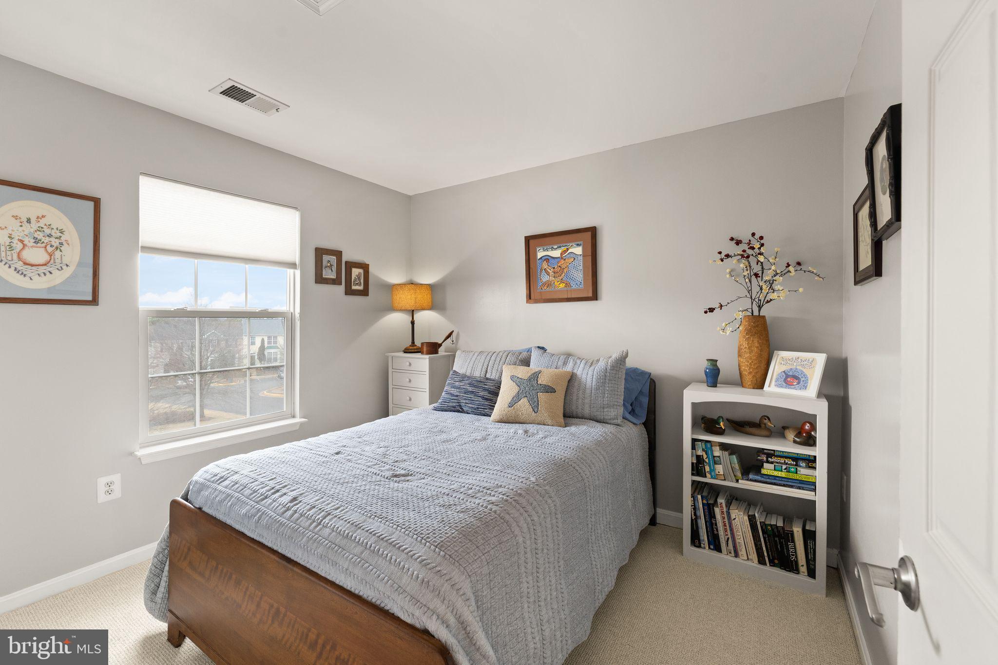 6377 St Timothys Lane Centreville, VA 20121 - Photo 40 of 58 a bedroom with a bed and a window