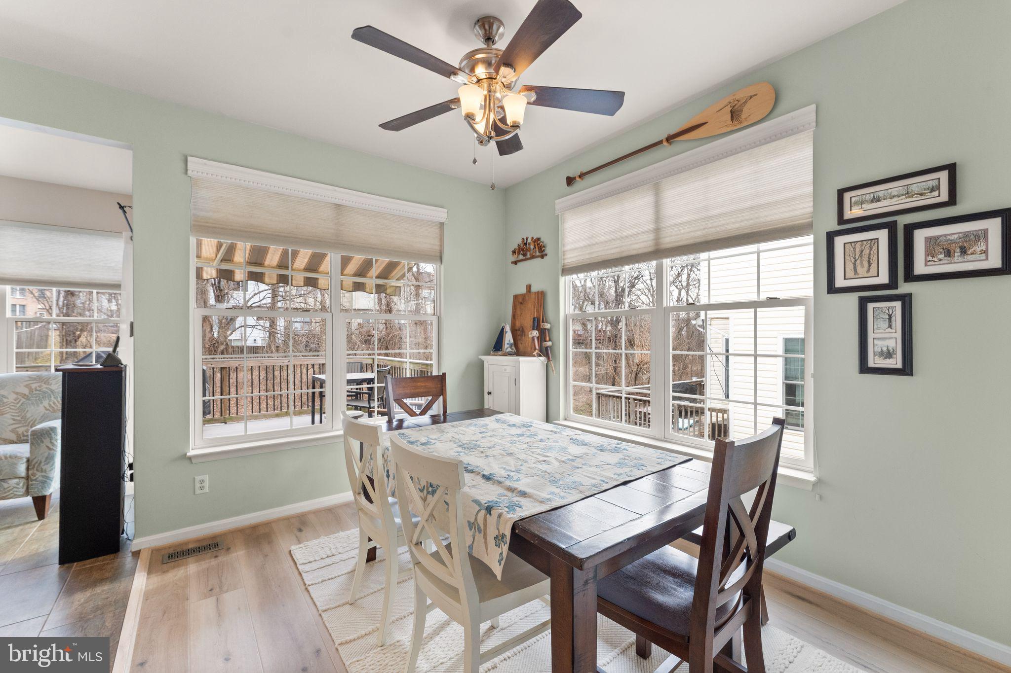 6377 St Timothys Lane Centreville, VA 20121 - Photo 5 of 58 a view of a dining room with furniture window and outside view