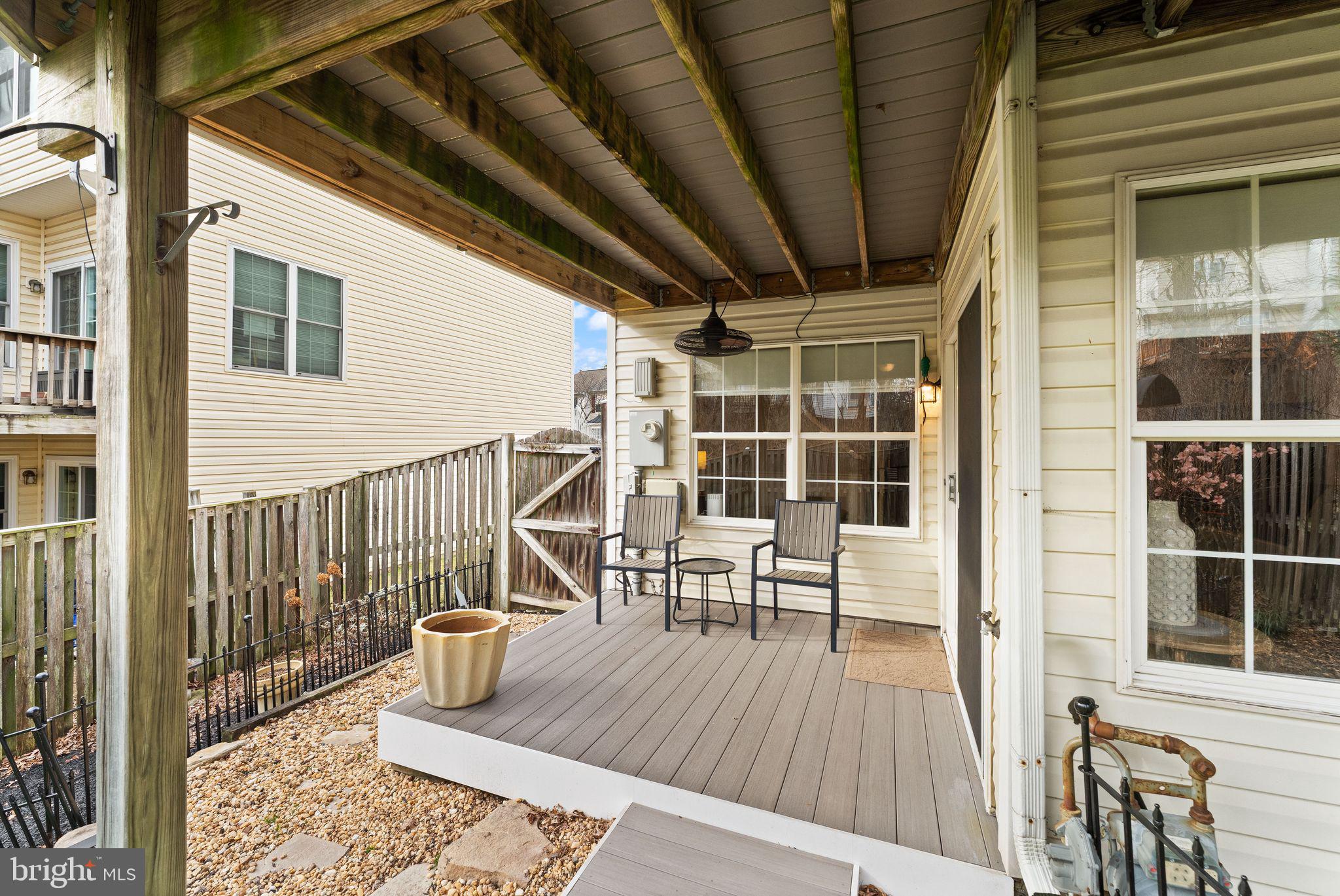 6377 St Timothys Lane Centreville, VA 20121 - Photo 51 of 58 a view of a balcony with chairs