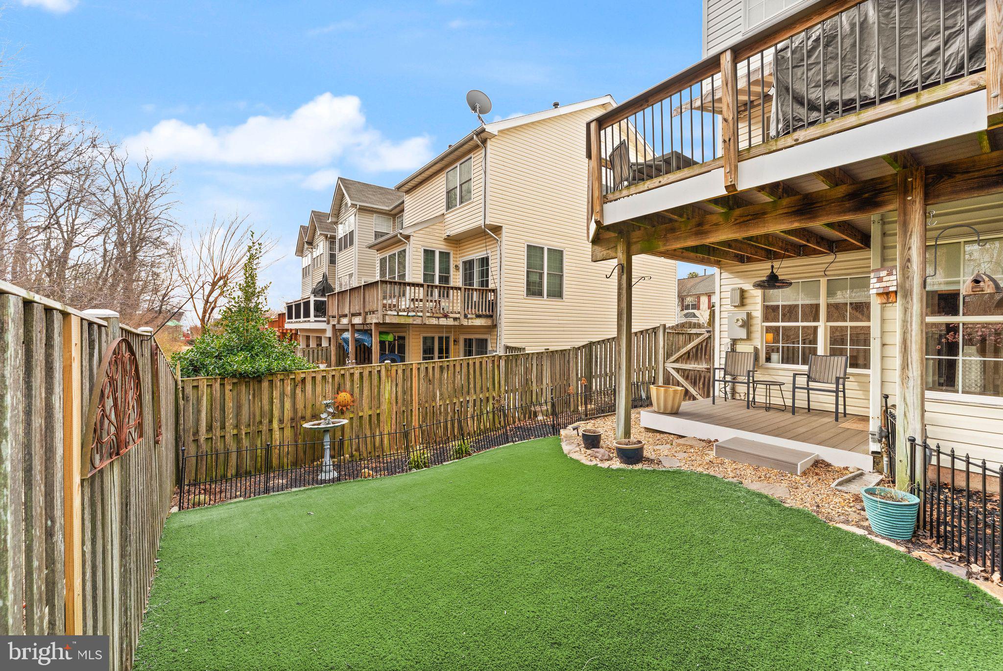 6377 St Timothys Lane Centreville, VA 20121 - Photo 52 of 58 a view of a house with a yard and sitting area