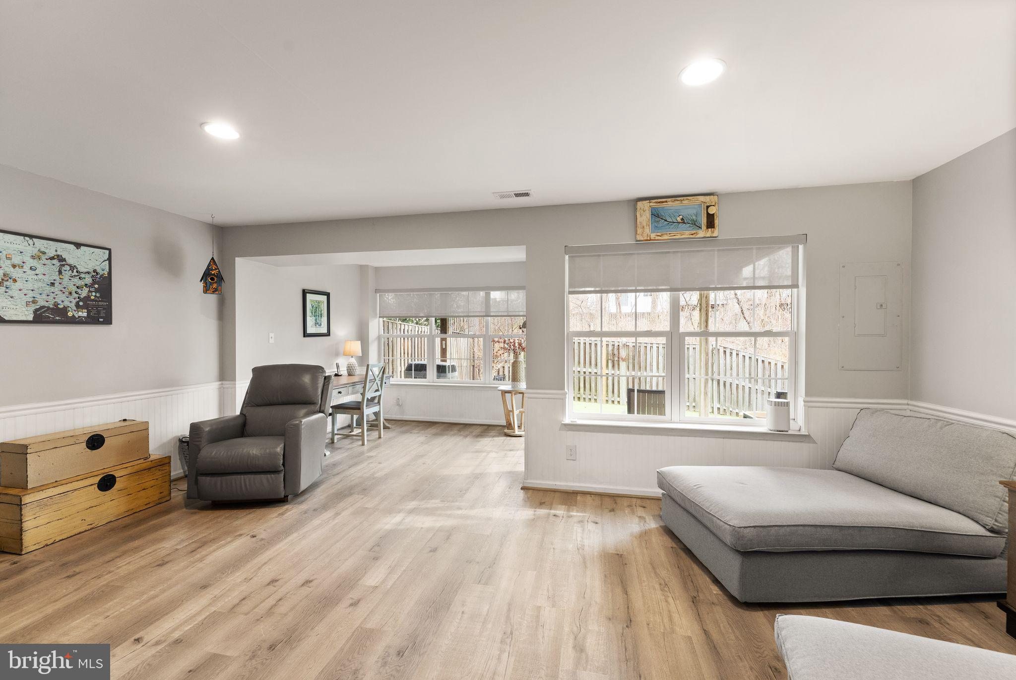 6377 St Timothys Lane Centreville, VA 20121 - Photo 9 of 58 a living room with furniture and a large window