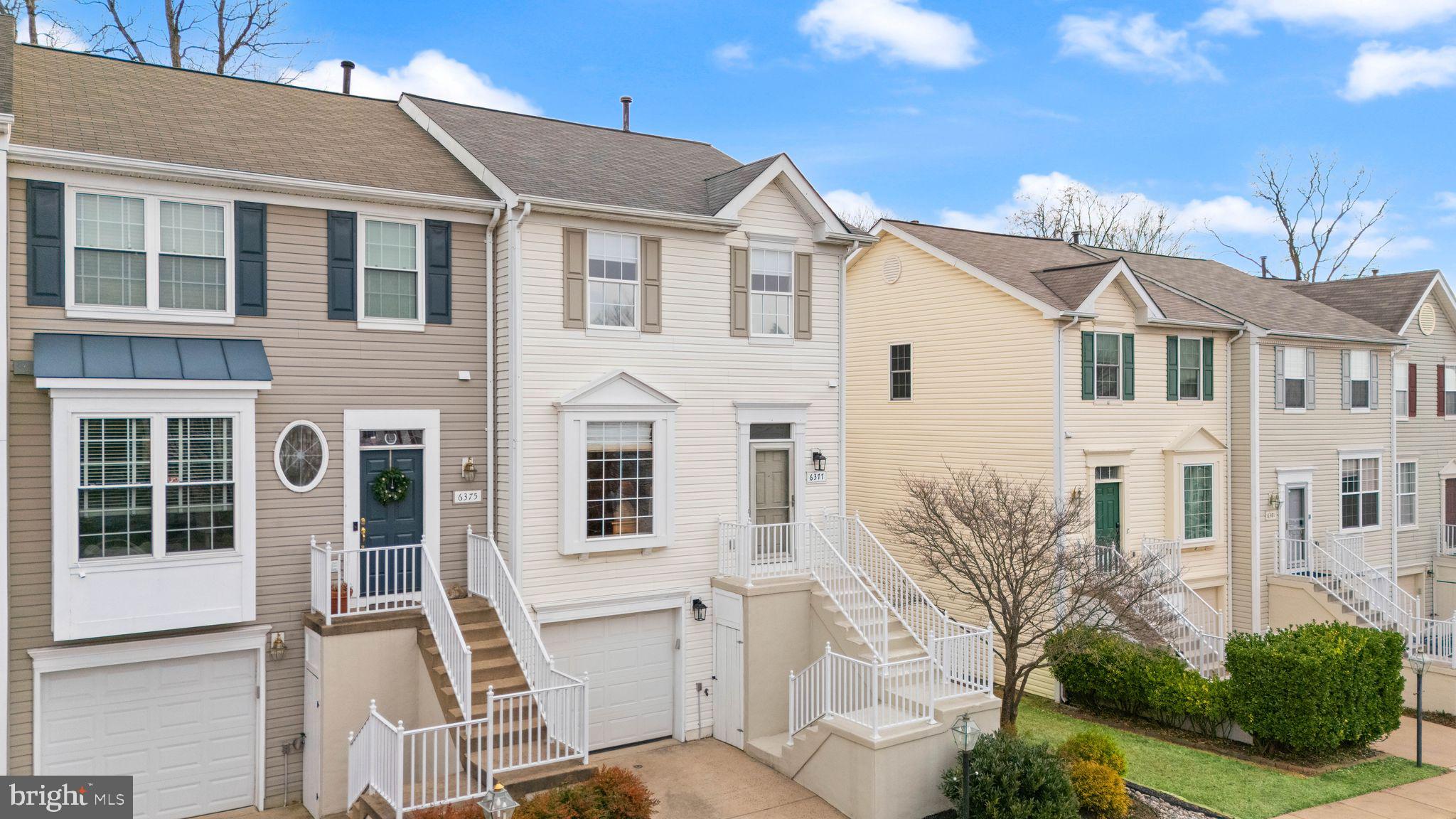 6377 St Timothys Lane Centreville, VA 20121 - Photo 10 of 58 a front view of a house with a yard