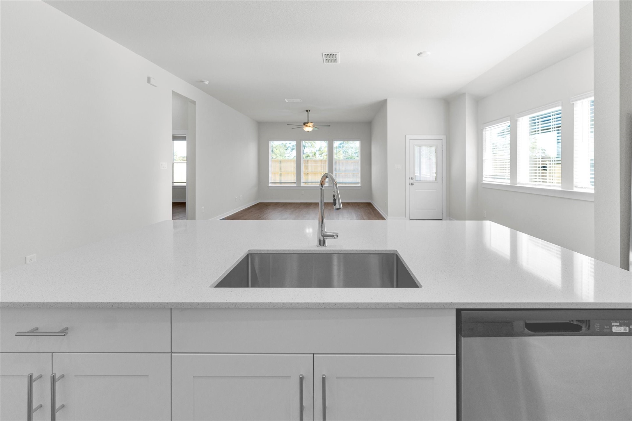 16914 Tulip Row Lane Cypress, TX 77429 - Photo 14 of 48 a room with a sink cabinets and wooden floor