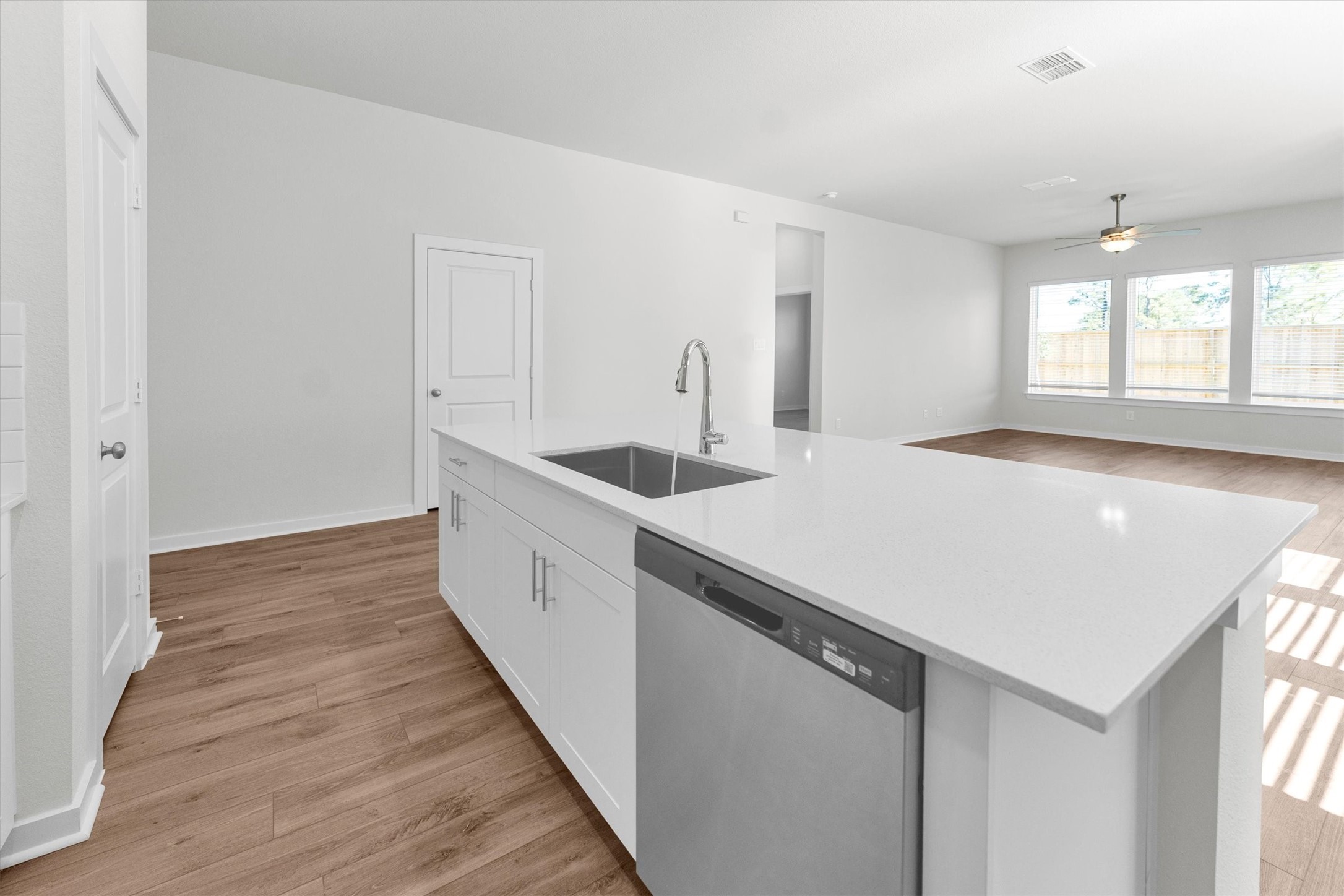 16914 Tulip Row Lane Cypress, TX 77429 - Photo 15 of 48 a view of a kitchen from the hallway