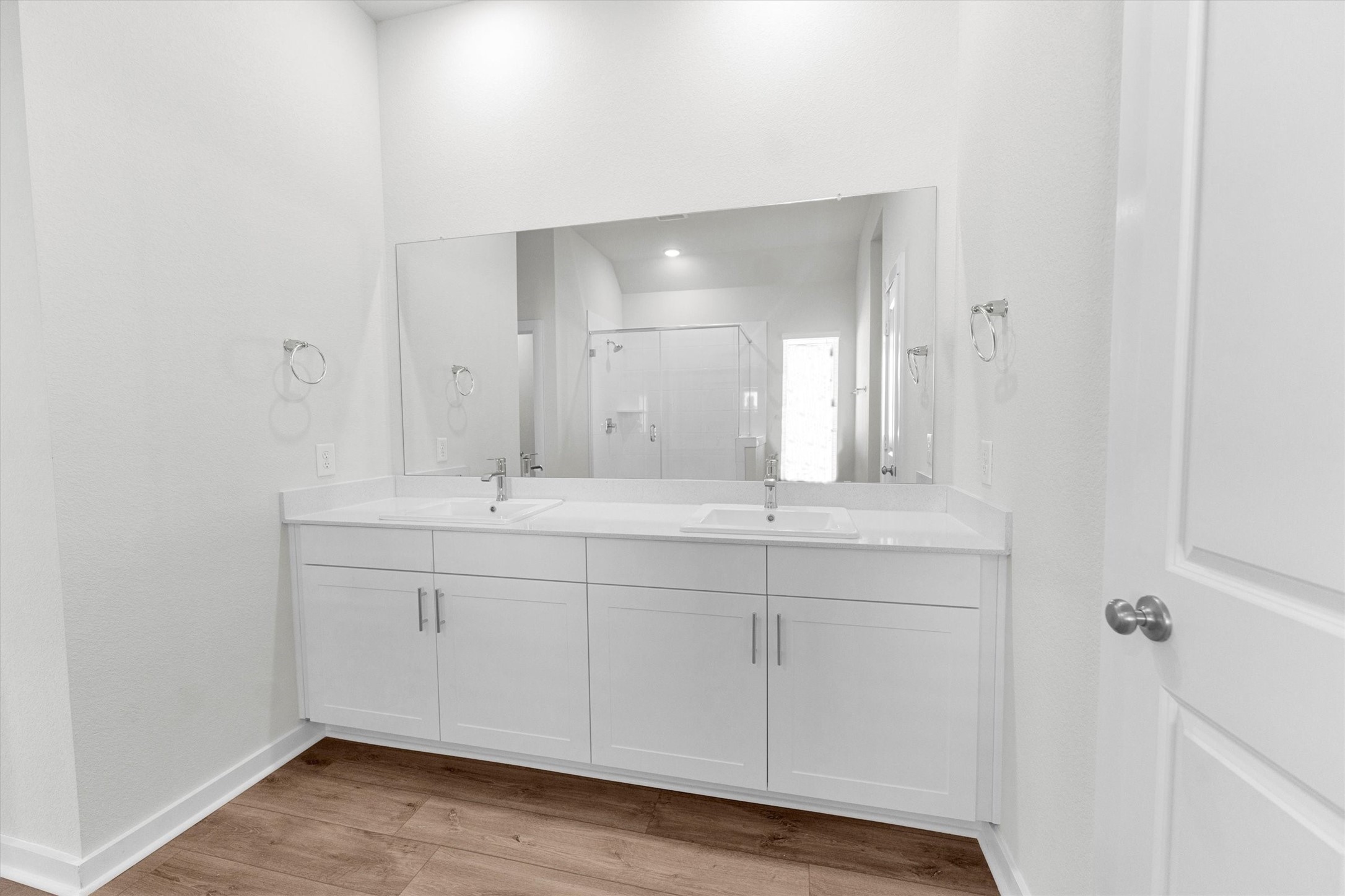 16914 Tulip Row Lane Cypress, TX 77429 - Photo 37 of 48 a bathroom with 2 sink and a mirror