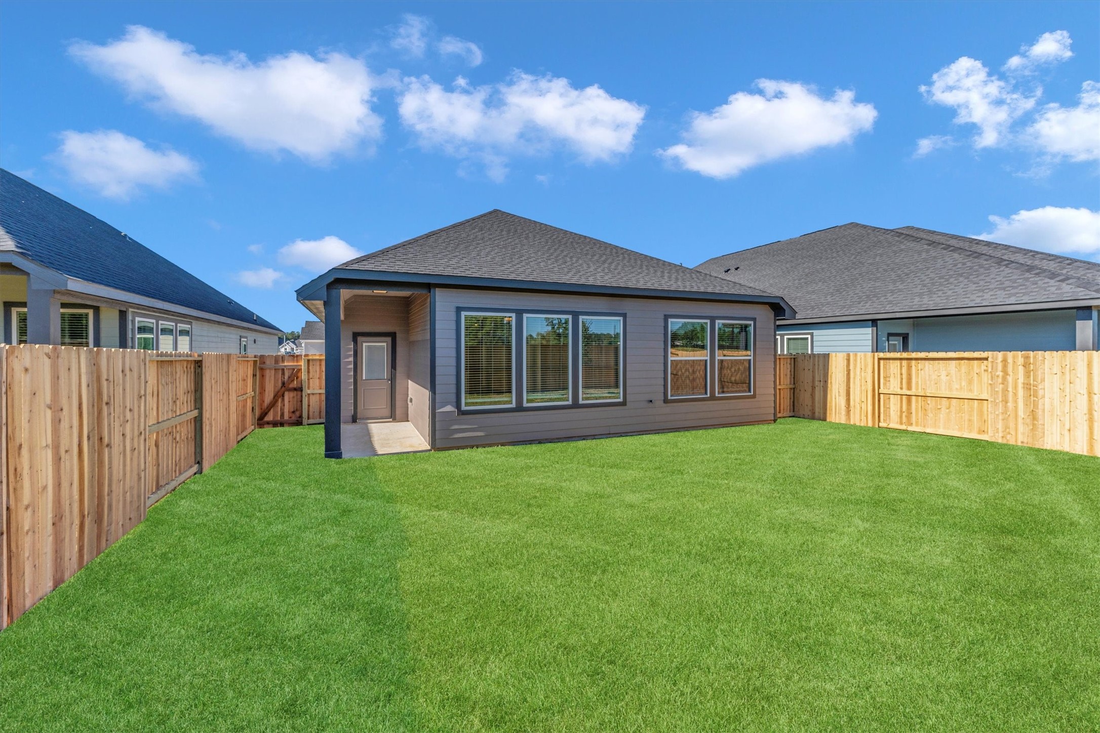 16914 Tulip Row Lane Cypress, TX 77429 - Photo 10 of 48 a view of a house with backyard porch and garden