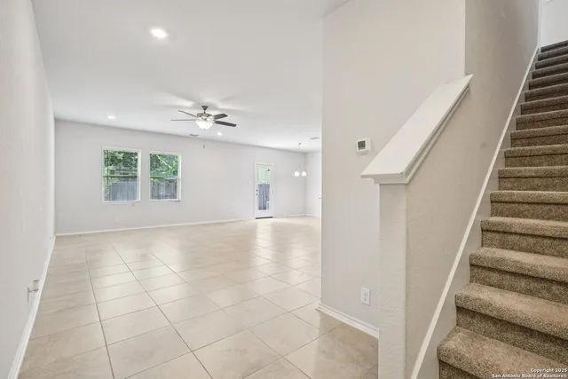 a view of a livingroom with a staircase