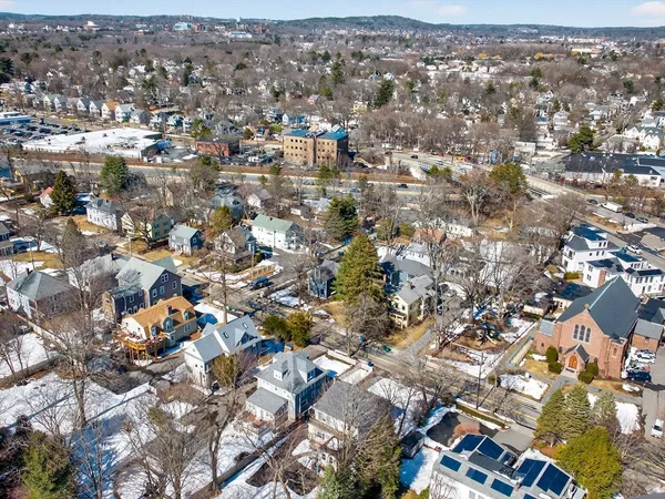 an aerial view of a city with lots of residential buildings