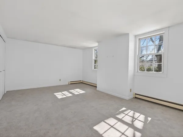 an empty room with windows