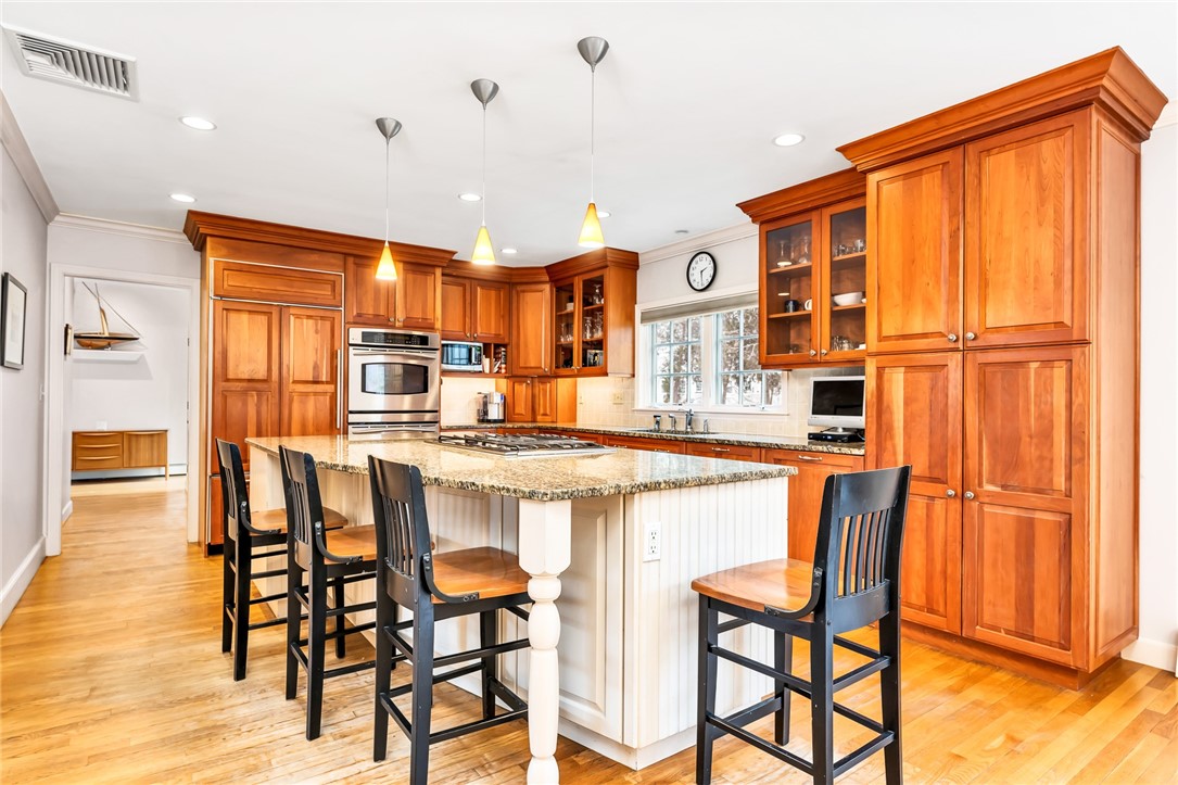 30 Adams Point Road Barrington, RI 02806 - Photo 5 of 25 view of spacious island with seating for 3-4 people
