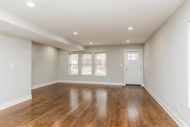 a view of small space with wooden floor
