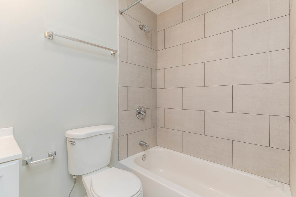 2109 West 18th Place Chicago, IL 60608 - Photo 26 of 63 a bathroom with a toilet and shower