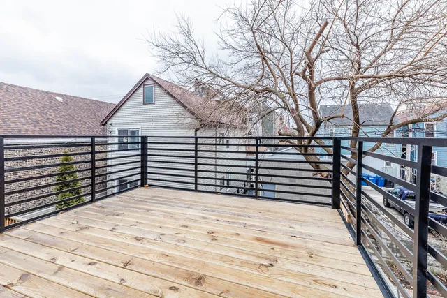 a kitchen with stainless steel appliances a stove microwave and sink