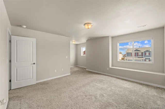 a view of an empty room with window