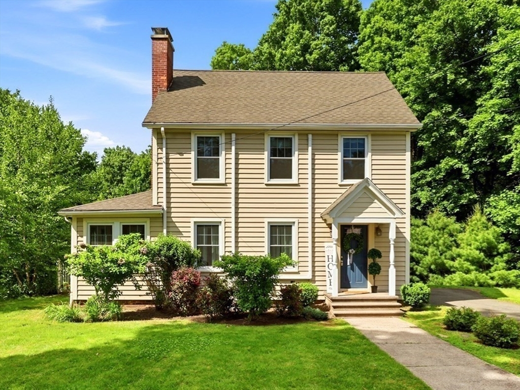 32 Lincoln Road Longmeadow, MA 01106 - Photo 31 of 36 a front view of a house with a yard and outdoor seating