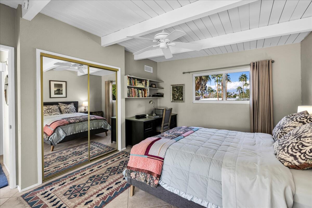 73501 Little Bend Trail Palm Desert, CA 92260 - Photo 26 of 57 a bedroom with a bed and a dresser