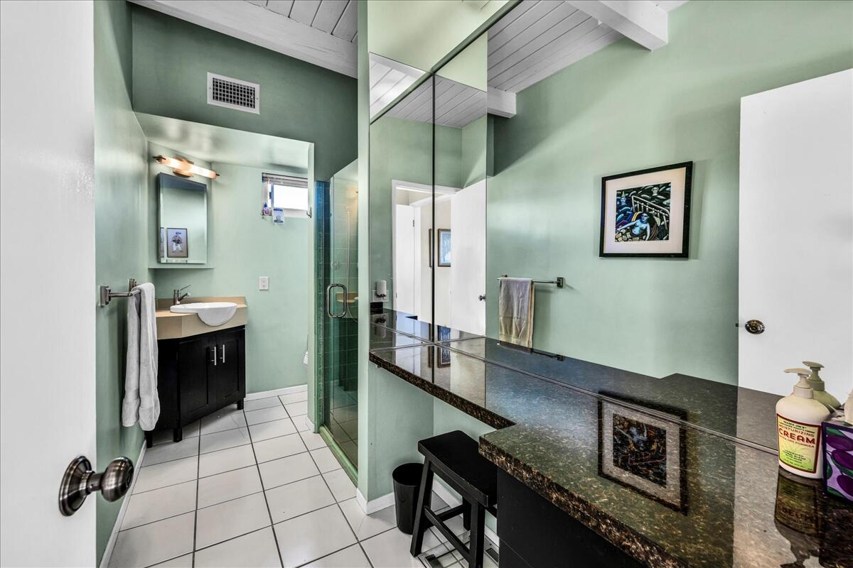 73501 Little Bend Trail Palm Desert, CA 92260 - Photo 27 of 57 a view of a hallway with seating area and bathroom