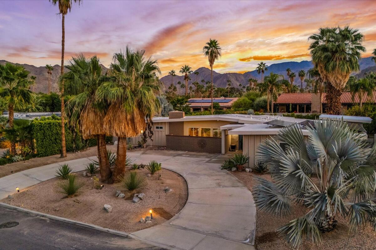 73501 Little Bend Trail Palm Desert, CA 92260 - Photo 47 of 57 a view of a backyard with plants and palm tree