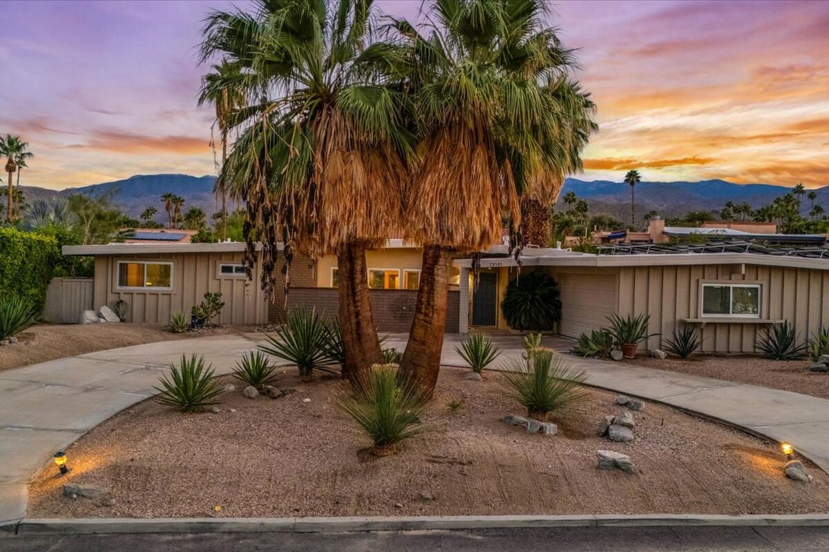 73501 Little Bend Trail Palm Desert, CA 92260 - Photo 6 of 57 a view of a chair and table in the small yard