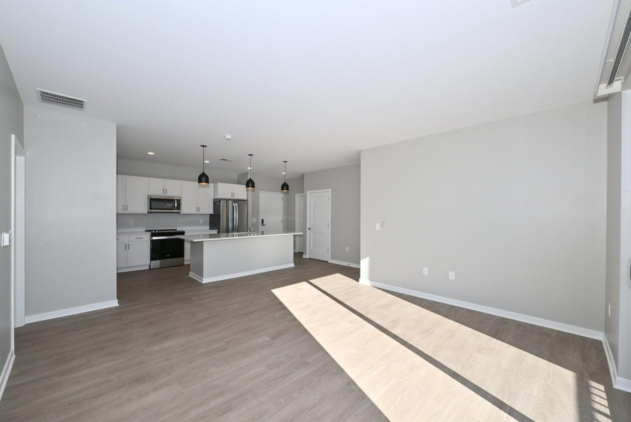 500 East Main Street, Unit 301 Waterford, WI 53185 - Photo 9 of 18 Interior - Living room to Kitchen3