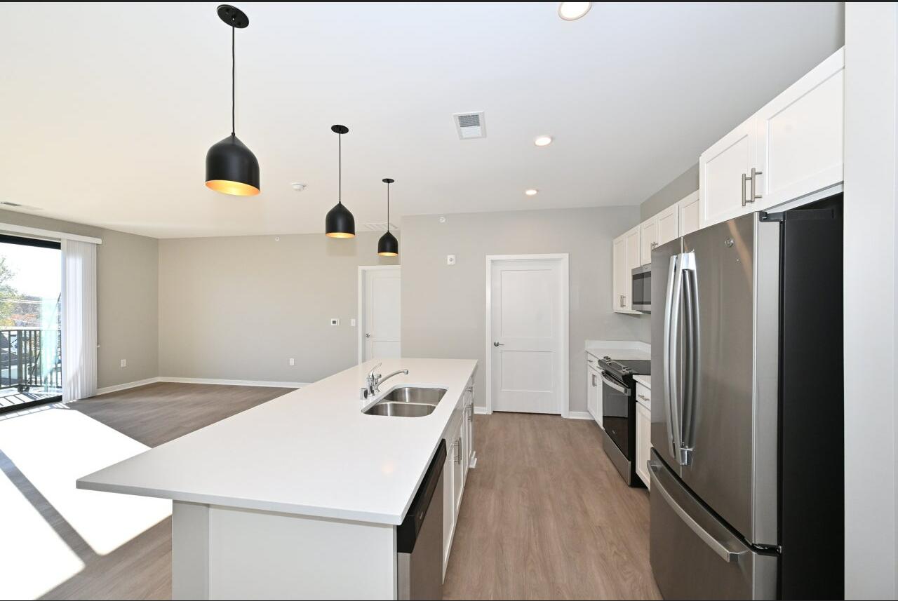 500 East Main Street, Unit 301 Waterford, WI 53185 - Photo 7 of 18 Interior - Kitchen Island