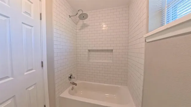 a bathroom with a bathtub