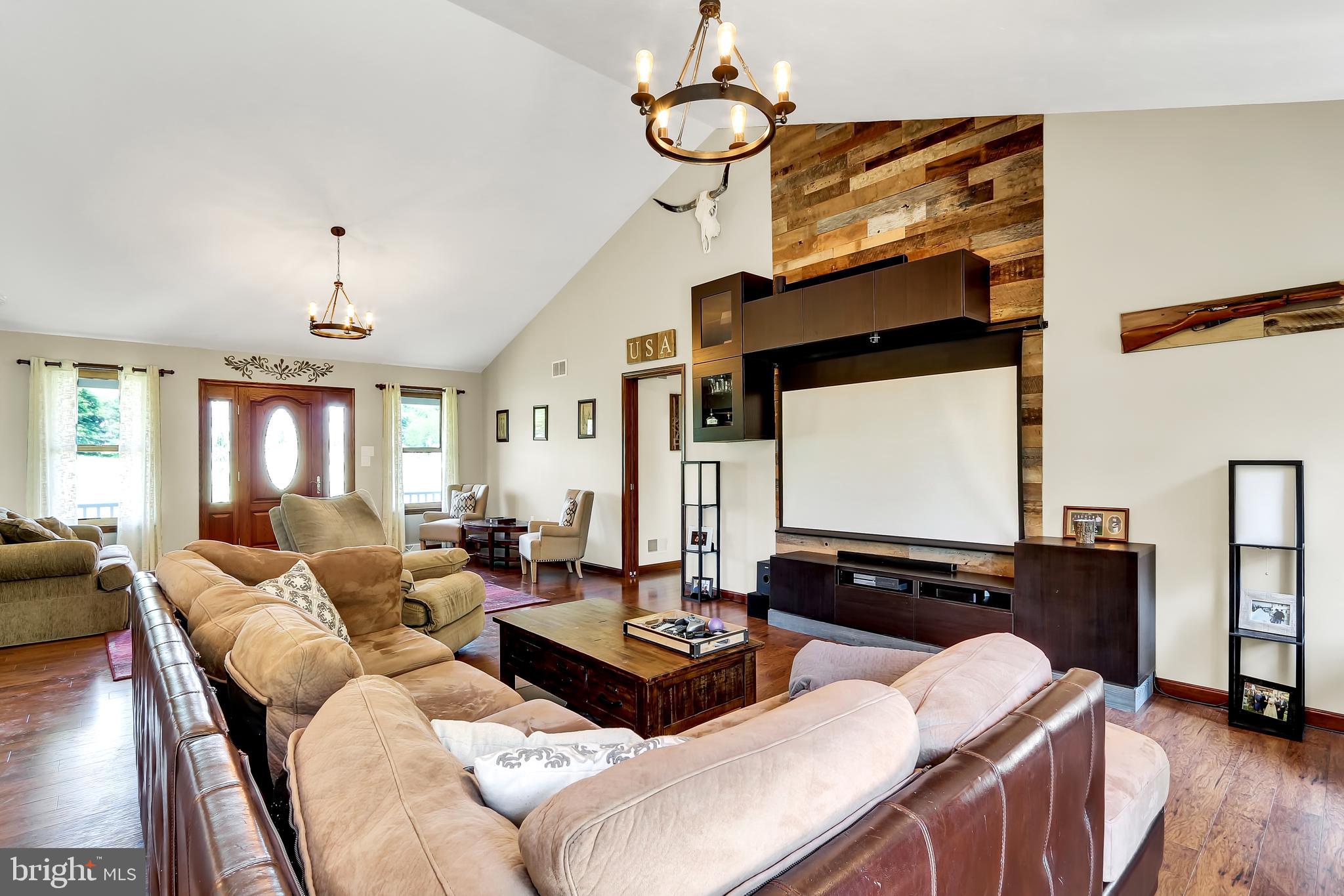 4442 Walters Hatchery Road Spring Grove, PA 17362 - Photo 4 of 26 Living Room with Built In Projection Screen