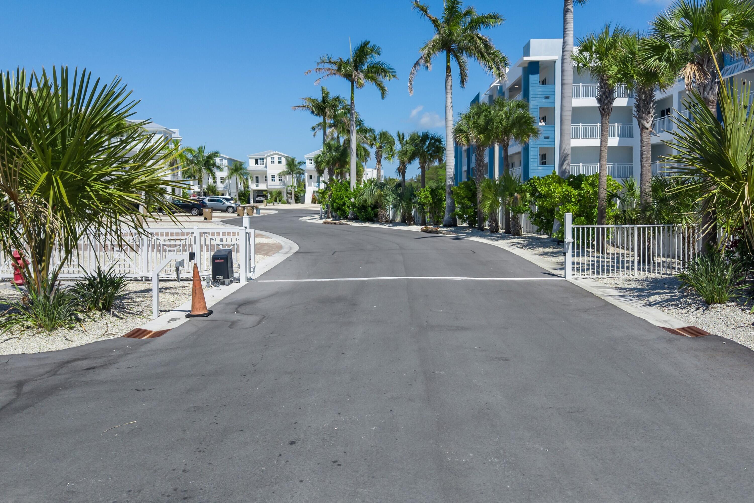 800 39th Street, Unit 28 Marathon, FL 33050 - Photo 19 of 21 a view of a street with a building in the background