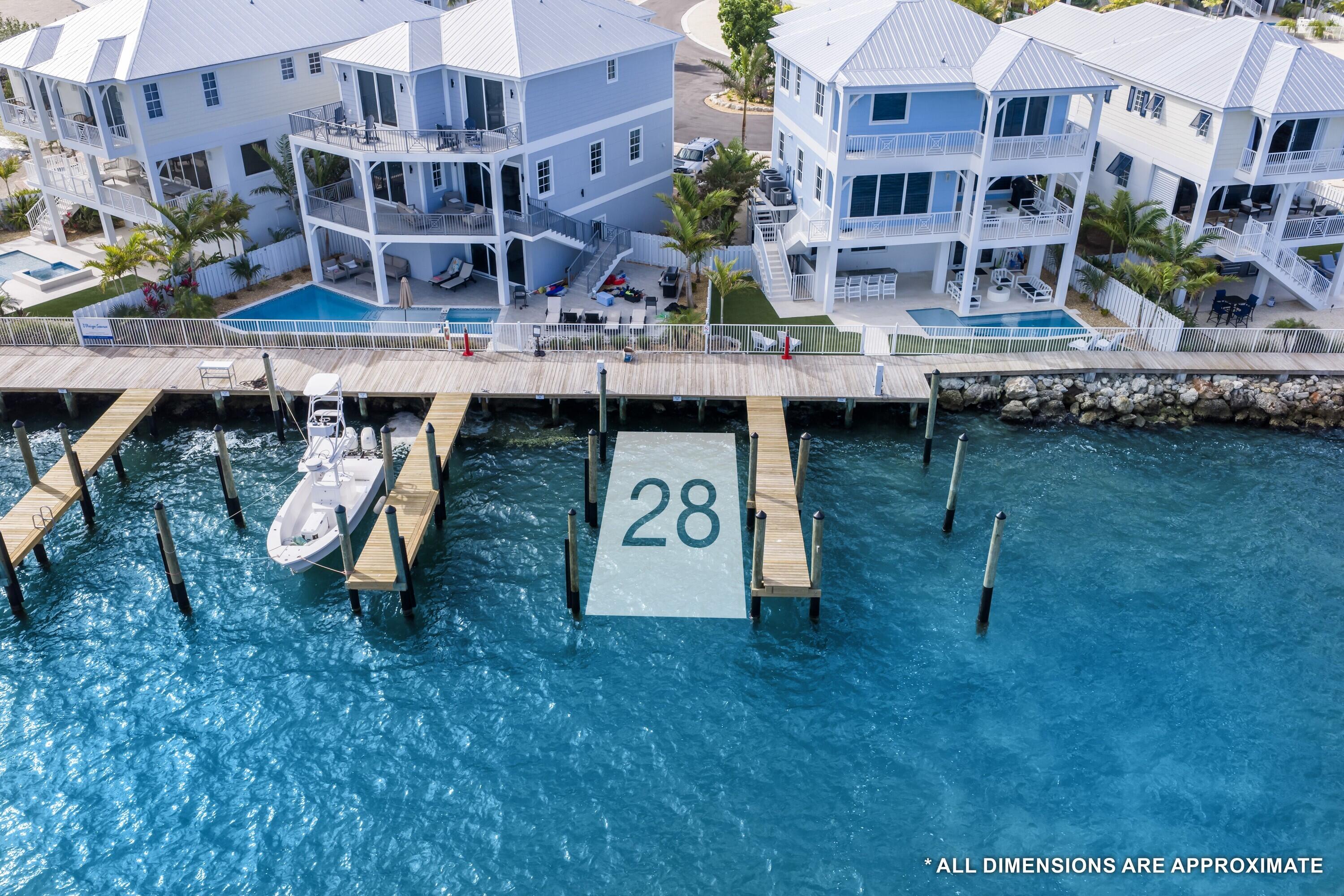 800 39th Street, Unit 28 Marathon, FL 33050 - Photo 2 of 21 a view of building with outdoor area