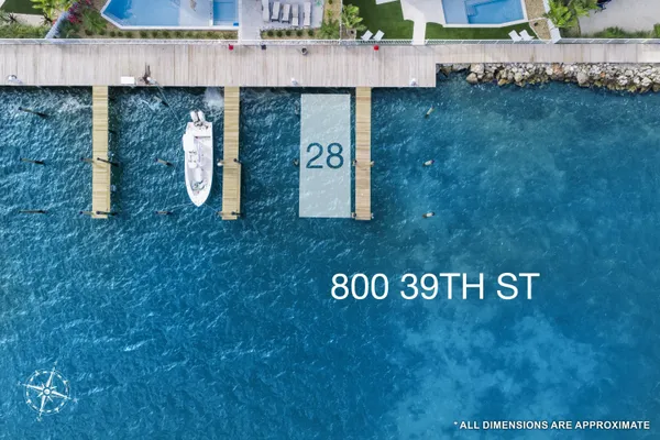 an aerial view of a house with swimming pool