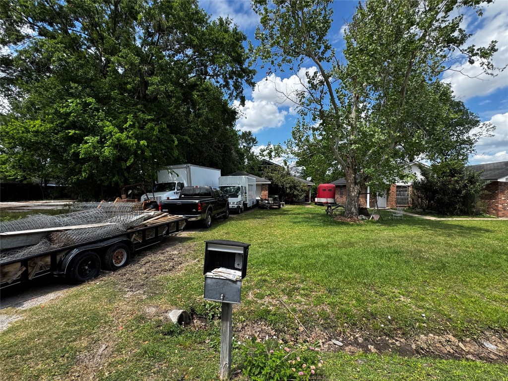 8910 Carousel Lane Houston, TX 77080 - Photo 3 of 7 a view of a backyard with sitting area