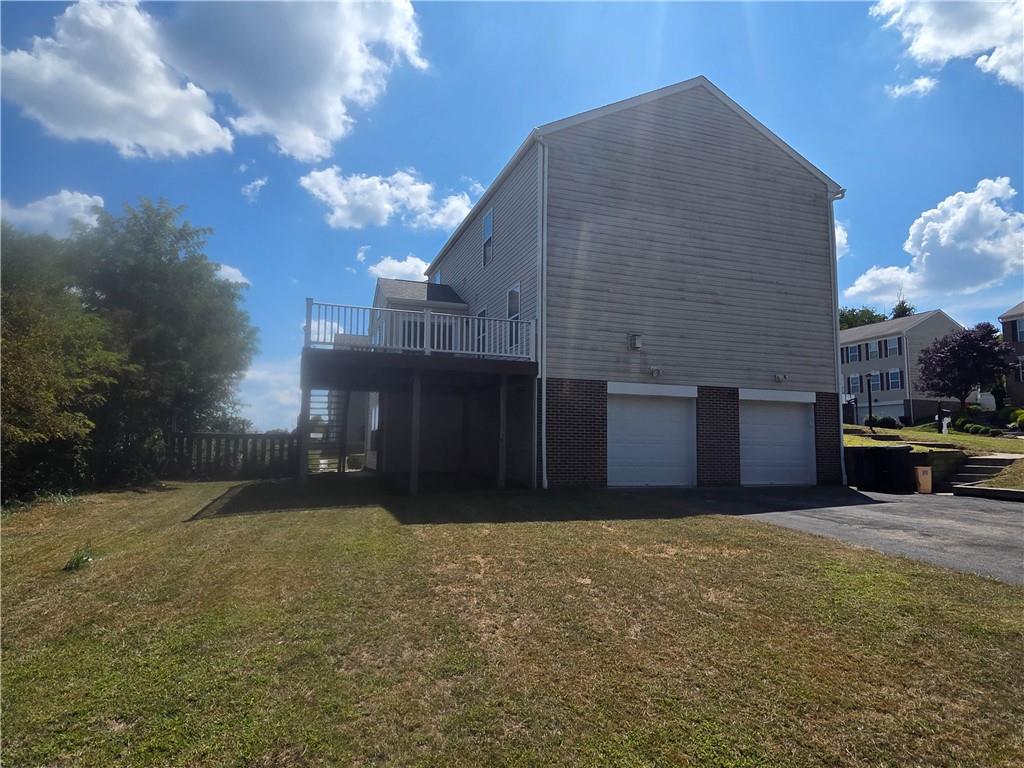 100 Willow Drive Natrona Heights, PA 15065 - Photo 3 of 20 a house view with a garden space