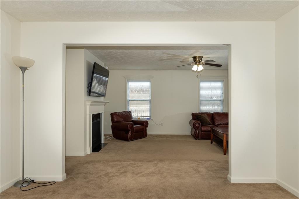 100 Willow Drive Natrona Heights, PA 15065 - Photo 5 of 20 a living room with furniture and a window