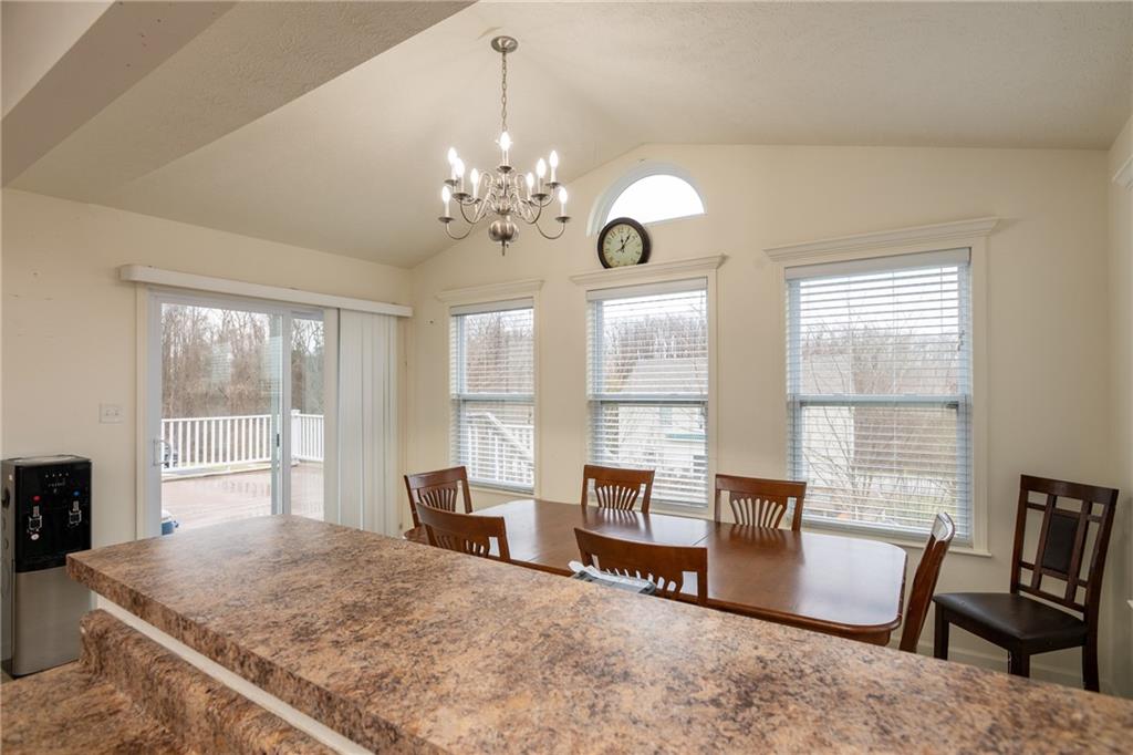 100 Willow Drive Natrona Heights, PA 15065 - Photo 9 of 20 a view of a livingroom with furniture window and wooden floor