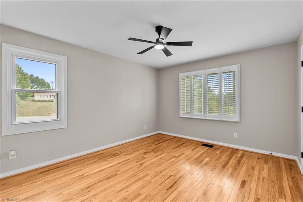 8309 Deep Valley Road Summerfield, NC 27358 - Photo 20 of 36 Primary Bedroom